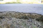 Roads Large Cracks From Shift Of Asphalt On Road Stock Photo