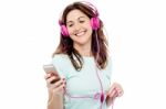 Middle Aged Woman Enjoying Listening Music Stock Photo