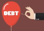 Hand Pushing Needle To Pop The Debt Balloon Stock Photo