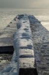 Ice-covered Pier Early In A Morning Stock Photo