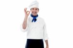 Smiling Male Chef Showing Ok Hand Sign Stock Photo