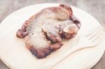 Pork Steak On Wooden Plate Stock Photo