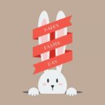 White Easter Rabbit With Red Ribbon Stock Photo