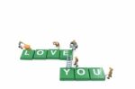 Miniature Worker Team Building Word Love You On White Background Stock Photo