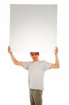 Teenage Boy Holding Blank Board Stock Photo