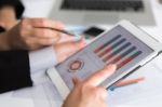 Hand Write On Various Financial Charts On The Table Stock Photo