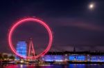 View Of The London Eye At Night Stock Photo