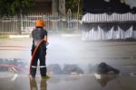 Fireman. Firefighters Fighting Fire During Training Stock Photo