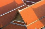 Roofs Of Temple And House Stock Photo