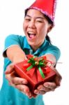 Woman Smile And Hold Gift Box In Hands Stock Photo