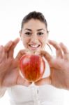 Young Lady Showing Red Apple Stock Photo