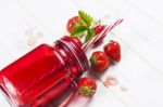 Strawberry Smoothie In Mason Jar With Straw Stock Photo