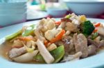 Fried Mix Vegetable And Shrimp In Dishes On Table Stock Photo