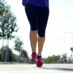 Runner Feet Running On Road Closeup On Shoe Stock Photo