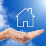 Home Icon On Sky Background Stock Photo