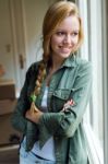 Young Beautiful Woman Moving In A New Home Stock Photo