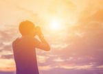 Silhouette Of A Young Man Like To Travel And Photography, Extend Stock Photo