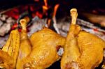 Chicken Roasting On Skewer Stock Photo