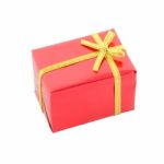 Red Gift Box And Golden Ribbon On White Background Stock Photo