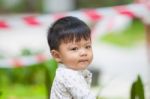 The Cute Boy In The Garden Stock Photo