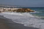 Puerto Banus Beach And Stone Pier Stock Photo