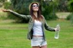 Beautiful Young Woman Enjoying Summer With Water Stock Photo