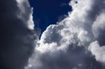 White Clouds In The Bright Blue Sky Stock Photo