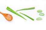 Aloe Vera Fresh Leaves With Aloe Vera Gel On Wooden Spoon Stock Photo