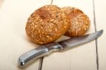 Organic Bread Over Rustic Table Stock Photo