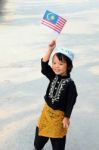 Young Boy Holding Flag Stock Photo