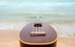 Ukulele With Beach Background Stock Photo