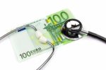 Hundred Euro Note With Professional Stethoscope On White Backgro Stock Photo