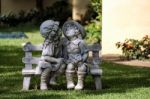 Statue Of A Boy And Girl In Calahonda Stock Photo