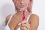 Pink Hair Attractive Woman Hold Pink Female Shaver In Hand Stock Photo