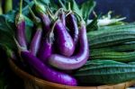 Fresh Healthy Eggplants On Dark Background Stock Photo