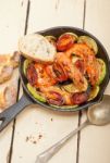 Roasted Shrimps With Zucchini And Tomatoes Stock Photo