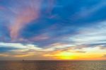 Sunset At Sea With Beautiful Clouds In The Evening And Twilight Stock Photo