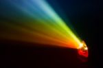 Beautiful Rainbow Color Wide Lens Projector With Light Beam For Movie And Cinema At Night . Smoke Texture Spotlight . Screening For Multimedia . Black Background  Stock Photo