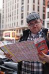 Hipster Young Man Looking The Map In A Urban Scene Stock Photo