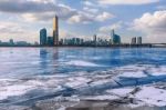 Ice Of Han River And Cityscape In Winter,sunset In Seoul, South Korea Stock Photo