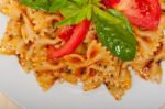 Italian Pasta Farfalle Butterfly Bow-tie And Tomato Sauce Stock Photo