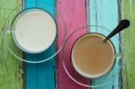 Coffee And Milk On Colorful Background Stock Photo