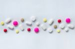 Top View Of The Pills On The White Background, The Drug And Capsule Pills On The Floor Stock Photo