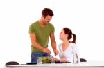 Husband Serving Food Her Wife Stock Photo