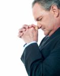 Matured male praying Stock Photo