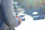 Young Man Chatting With Their Smartphone Stock Photo