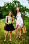 Two Girls Getting Ready For A Picnic Stock Photo