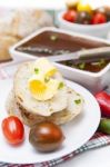 Slices Of Bread And Butter With Tomatoes, Peppers And Pate Stock Photo