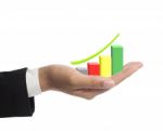 Business Hand Holding Growing Graph Stock Photo