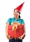 Woman Smile And Hold Gift Box In Hands Stock Photo